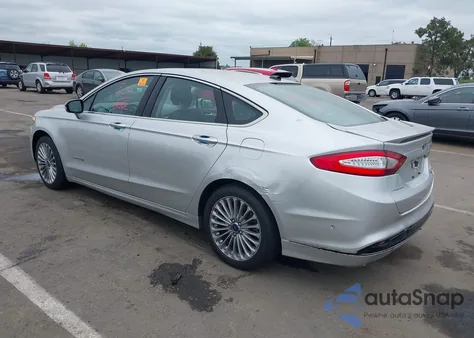 2013 Ford Fusion Hybrid Titanium z USA, uszkodzony, nr VIN 3FA6P0RUXDR388796